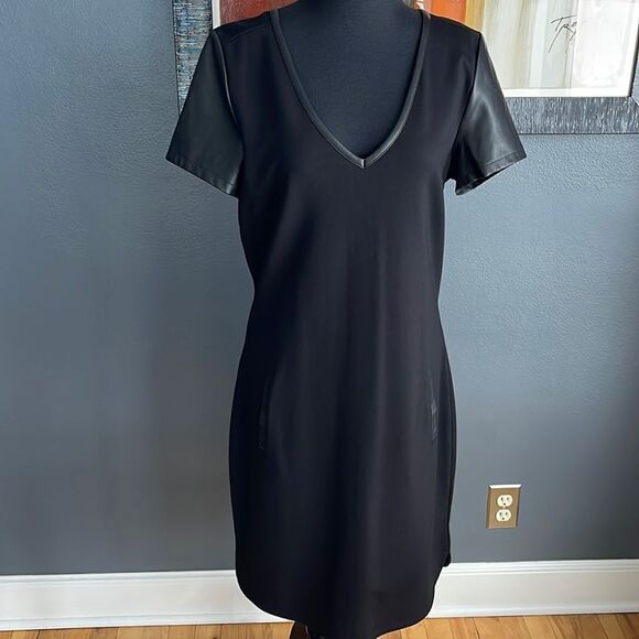Banana Republic black faux leather V neckline, sleeves, & welted pockets midi. - Picture 1 of 7